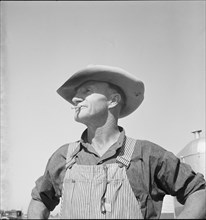 Nebraska farmer come to pick peas, Near Calipatria, California, 1939. Creator: Dorothea Lange.