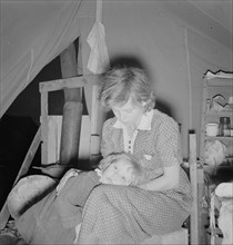 Young mother, aged twenty-two..., FSA mobile camp, Merrill, Klamath County, Oregon, 1939. Creator: Dorothea Lange.