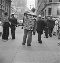 Street hawker selling Consumer's..., 42nd Street and Madison Avenue, New York City, 1939. Creator: Dorothea Lange.
