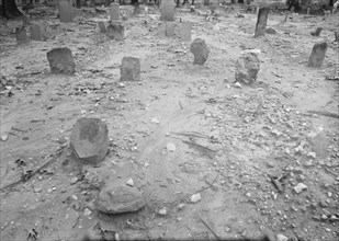 A red clay Negro cemetery, Bethel Hill High School, Person County, North Carolina, 1939. Creator: Dorothea Lange.