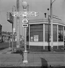 Sign of service station, U.S. 99, Josephine County, Oregon, 1939. Creator: Dorothea Lange.