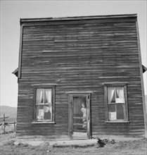 Possibly: Member of Ola self help sawmill co-op lives in what was once..., Gem County, Idaho, 1939. Creator: Dorothea Lange.