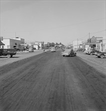 Looking down main street of a frontier town..., Tulelake, Siskiyou County, CA, 1939. Creator: Dorothea Lange.