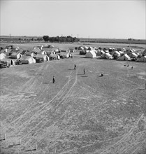 Farm Security Administration (FSA) migratory labor camp, Brawley, Imperial County, California, 1939. Creator: Dorothea Lange.