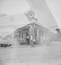Rural filling station becomes community..., 4 July, near Chapel Hill, North Carolina, 1939 Creator: Dorothea Lange.