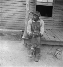 Father of sharecropper family, Person County, North Carolina, 1939. Creator: Dorothea Lange.