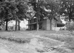 The one-and-a-half story part of this house was built fifty..., Person County, North Carolina, 1939. Creator: Dorothea Lange.