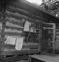 Porch on Negro share tenant cabin, near Gordonton, North Carolina, 1939. Creator: Dorothea Lange.