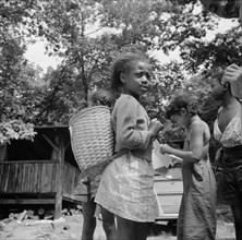 A letter from home is always good news, Camp Fern Rock, Bear Mountain, New York, 1943 Creator: Gordon Parks.