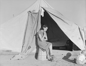 Young migrant mother..., FSA emergency camp, Calipatria, California, 1939. Creator: Dorothea Lange.