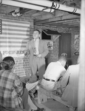 Air raid wardens' meeting in zone nine, Southwest area, Washington, D.C, 1942. Creator: Gordon Parks.