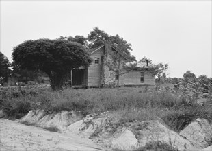 Story-and-a-half weatherboard house, Person County, North Carolina, 1939. Creator: Dorothea Lange.