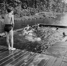 Shallow swimming pool for learners at Camp Nathan Hale, Southfields, New York, 1943 Creator: Gordon Parks.
