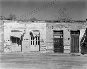 Main street storefronts, Edwards, Mississippi, 1936.  Creator: Walker Evans.