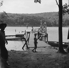 The lake and swimming activities at Camp Nathan Hale, Southfields, New York, 1943 Creator: Gordon Parks.