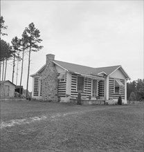 A new very fancy log bungalow..., near Gordonton, North Carolina, 1939. Creator: Dorothea Lange.