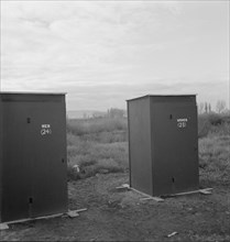 Twenty-four portable toilets, mobile camp (FSA), equipment, Merrill, Klamath County, Oregon, 1939. Creator: Dorothea Lange.