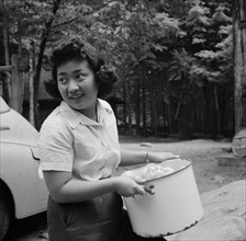 Miss Sumi Yumaguchi, Japanese dietican, Camp Ellen Marvin, Arden, New York, 1943. Creator: Gordon Parks.