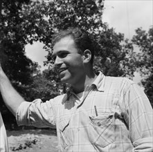 Milton Reiner, program director at Camp Nathan Hale, Southfields, New York, 1943. Creator: Gordon Parks.