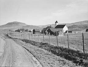 Voting farmers in Squaw Creek Valley, entering Ola, Gem County, Idaho, 1939. Creator: Dorothea Lange.