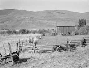 Farmyard in Squaw Creek Valley, Ola self-help sawmill co-op, Gem County, Idaho, 1939. Creator: Dorothea Lange.