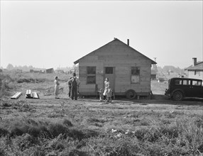 Mother and two children, husband, his brother and brother's..., near Klamath Falls, Oregon, 1939. Creator: Dorothea Lange.