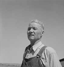 Chris Ament, German-Russian dry land wheat farmer, who..., south of Quincy, Washington, 1939. Creator: Dorothea Lange.