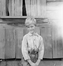 The youngest Arnold boy who also works at land clearing, Michigan Hill, Western Washington, 1939. Creator: Dorothea Lange.