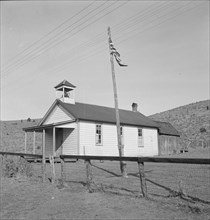 Eastern Oregon county school in clearing in the sage bush, Baker County, Oregon, 1939. Creator: Dorothea Lange.