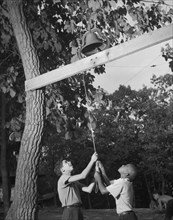 Dinner bell, Camp Nathan Hale, Southfields, New York, 1943 Creator: Gordon Parks.