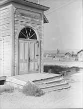 Old Catholic church on edge of potato town, Merrill, Klamath County, Oregon, 1939. Creator: Dorothea Lange.