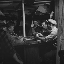 On board the fishing boat Alden, out of Gloucester, Massachusetts, 1943. Creator: Gordon Parks.