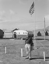 The camp manager at camp entrance, FSA, Merrill, Klamath County, Oregon, 1939. Creator: Dorothea Lange.