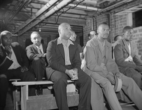 Air raid wardens' meeting in zone nine, Southwest area, Washington, D.C, 1942. Creator: Gordon Parks.