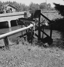 Possibly: Waterwheel for field irrigation..., north of West Stayton, Marion County, Oregon, 1939. Creator: Dorothea Lange.