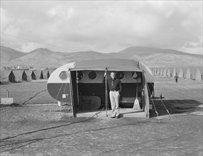 The camp manager, the office trailer and view of FSA camp, Merrill, Klamath County, Oregon, 1939. Creator: Dorothea Lange.