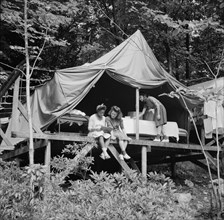 Rest period at Camp Gaylord White, Arden, New York, 1943. Creator: Gordon Parks.
