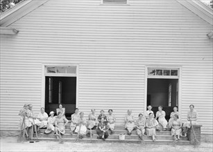 Women of the congregation of Wheeley's Church on steps..., Gordonton, North Carolina, 1939. Creator: Dorothea Lange.