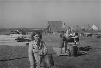Possibly: Facilities for washing in the camp for white flood...at Forrest City, Arkansas, 1937. Creator: Walker Evans.