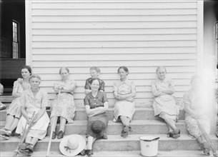 Women assembled at Wheeley's Church near Gordonton, North Carolina, to clean..., 1939. Creator: Dorothea Lange.
