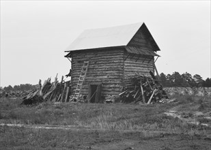 Tobacco barn without front shelter, Person County, North Carolina, 1939. Creator: Dorothea Lange.