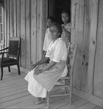 Wife of tenant farmer with two of her six children..., Chatham County, North Carolina, 1939. Creator: Dorothea Lange.