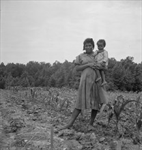 Wife and child of young sharecropper..., Hillside Farm, Person County, North Carolina, 1939. Creator: Dorothea Lange.
