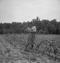 Wife and child of...sharecropper..., Hillside Farm, Person County, North Carolina, 1939. Creator: Dorothea Lange.