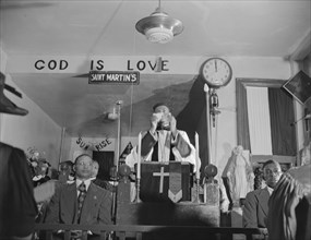 Possibly: Congregation of the St. Martin's Spiritual Church, Washington, D.C., 1942. Creator: Gordon Parks.