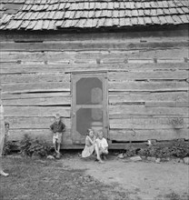Log home of rural non-farm family, Orange County, North Carolina, 1939. Creator: Dorothea Lange.