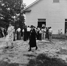 Congregation leaving for home after services, Wheeley's Church, Person County, North Carolina, 1939. Creator: Dorothea Lange.