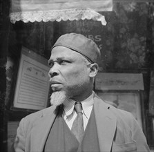 New York, New York. A follower of the late Marcus Garvey who started the "Back to Africa" movement.