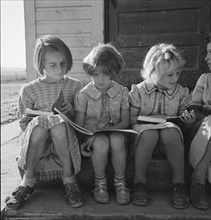 Girls of Lincoln Bench School study their reading lesson. Near Ontario, Malheur County, Oregon.