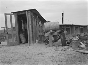 Entrance to Mr. and Mrs. Wardlow's dugout basement home. Dead Ox Flat, Malheur County, Oregon.